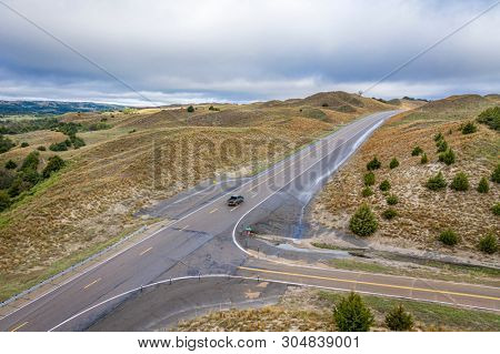 highway crossing in Nebraska Sandhills - overhead aerial view in spring scenery