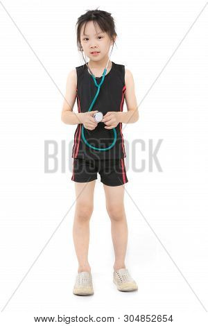 Pretty Asian Girl In Sportswear Wears Green Stechoscope And Posing To Camera, Studio Shot On White B