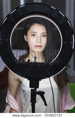 Photo Pass Through The Circle Studio Light Of Beautiful Face Of Asian Model Woman.