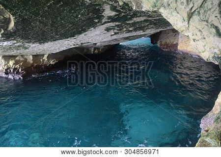 Rosh Ha Nikra. Israel. Sea Waves And White Rock. A Unique Tourist Attraction Located On The North-we