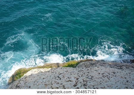 Rosh Ha Nikra. Israel. Sea Waves And White Rock. A Unique Tourist Attraction Located On The North-we