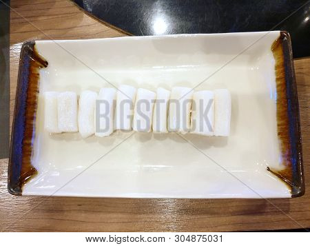 Korean Food Style, Top View Of Tokboki On White Plate In Restaurant, Ready For Cooking