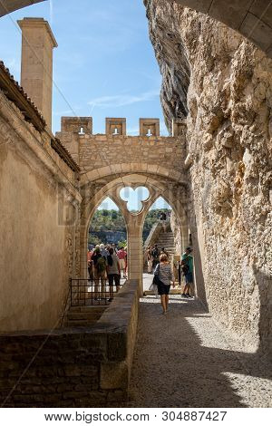Rocamadour, France - September 3, 2018: People In  Basilica Of St-sauveur At Pilgrimage Town Of Roca