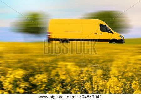 Fast Parcel Delivery, Yellow Mail Van On Country Road.