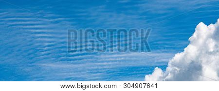 Blue Sky Cumulus Clouds. Clear Cloudscape On Sunny Day. Serenity And Calm