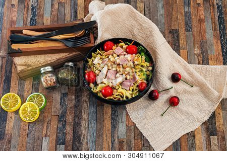cereal specialties cooked with salad, roasted chicken aiguillette cured with salted and bacon