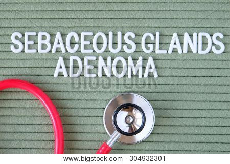 Adenoma Sebaceous Glands- Text From White Letters On  Green Background With  Stethoscope, Medical Co
