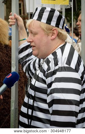 London, United Kingdom, June 4th 2019:- A Boris Johnson Lookalike Dressed In Prison Uniform In Parli