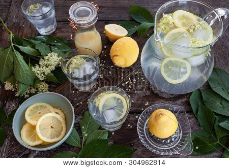 Homemade Lemonade Made With Elderflower Sirup And Slices Of Lemon