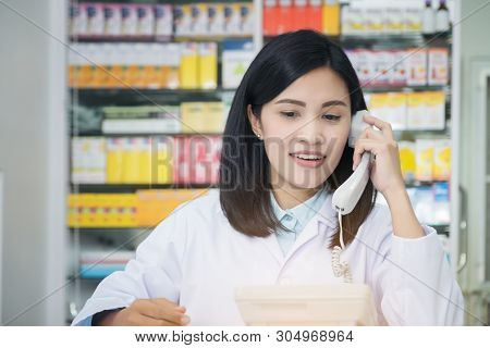 Nurse Taking Hospice Patient Blood Pressure Call Telephone