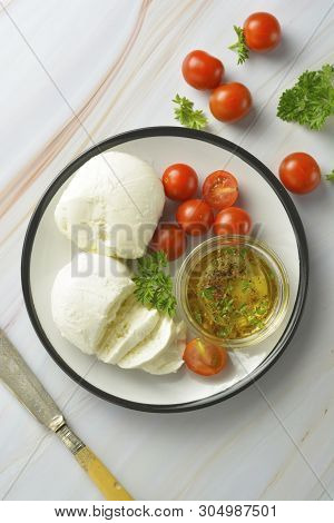 Mozzarella Cheese And Cherry Tomatoes With Spices. Homemade Mozzarella Cheese, Isolated.