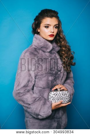 With Her Feminine Chic Style. Pretty Woman In Fashionable Fur Coat. Fashion Model Wear Luxurious Fur