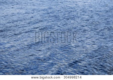 Water Surface Clean Texture Background. Abstract Blue Water Relaxation Concept