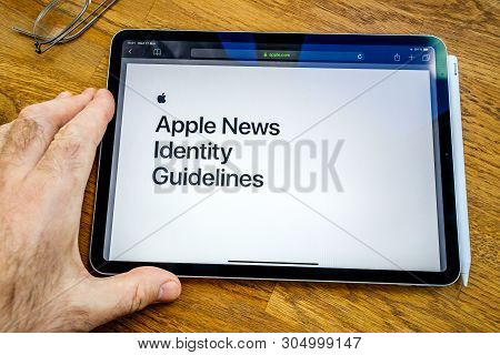 Paris, France - Mar 27, 2019: Pov Personal Perspective On Apple News Webpage Seen On Modern Ipad Pro