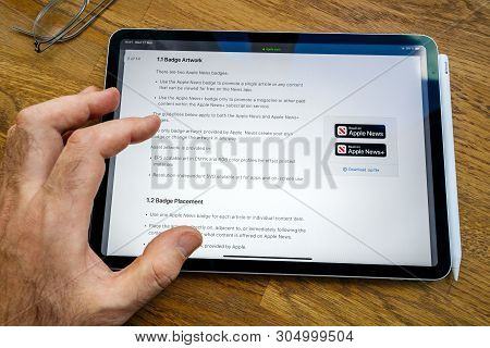 Paris, France - Mar 27, 2019: Pov Personal Perspective On Apple News Webpage Seen On Modern Ipad Pro