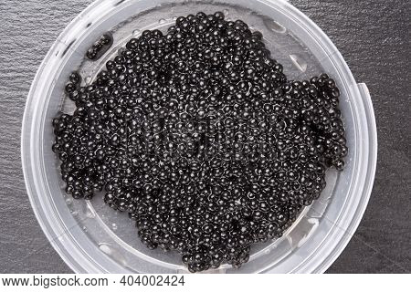 Paddlefish Black Caviar In A Plastic Plate,  Gourmet And Delicious Food, Close Up