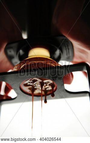 Espresso From Manual Coffee Maker, Bottom View, Close-up