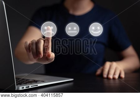 Woman Using Laptop And Emoticon Hologram Effect.