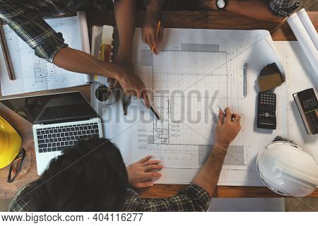 Engineer Meeting In Modern Office With Architecture Interior Designer. Discussion Of Architectural P