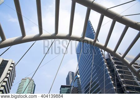 Sathorn Road, Bangkok - Nov 21, 2014: High-rise Buildings And A Sky Walk At Sathorn-narathiwas Inter