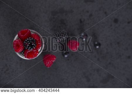 Healthy Diet With Red Fruits Such As Blackberries, Blueberries, Raspberries And Yogurt.
