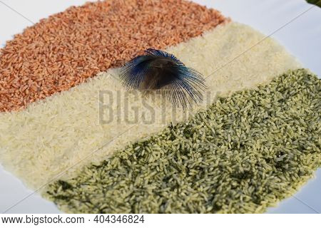 Indian Flag Tri Color Theme Depicted By Natural Colored Rice Grains On Occasion Of Indian Republic D