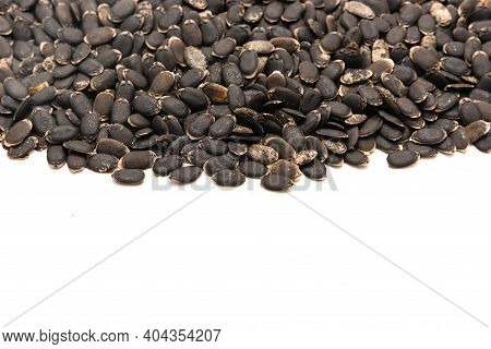 Spreading Of Luffa Or Loofah, Luffa Aegyptiaca Seeds With Copy Space Isolated On White Background