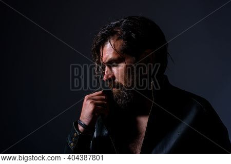 Biker In Lether Jacket. Brutal Bearded Man. Silhouette Of Handsome Man. Barber Shop. Pensive Man. Bl