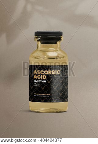 Ascorbic acid Vitamin C injection glass bottle with luxurious label for health and wellness product packaging