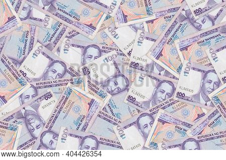 100 Philippine Piso Bills Lies In Big Pile. Rich Life Conceptual Background. Big Amount Of Money