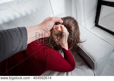 Victim Of Home Violence. Woman In Fear Of Domestic Abuse. Violence Against Woman. Man Beating Woman.