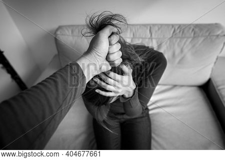 Violence Against Women. Woman In Fear Of Domestic Abuse. Sexual Abuse. Man Beating Up His Wife