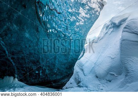 Ice Cave Background. Magnificent Glacier Formation. 
