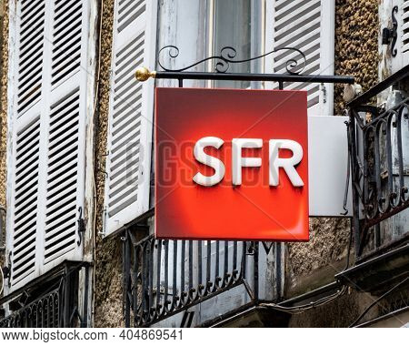 BAYONNE, FRANCE - CIRCA DECEMBER 2020: SFR shop sign in the town center. SFR is a French telecom company.