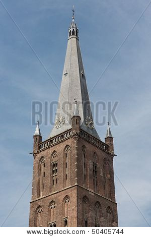 Dutch Church Tower Against A Blue Sky