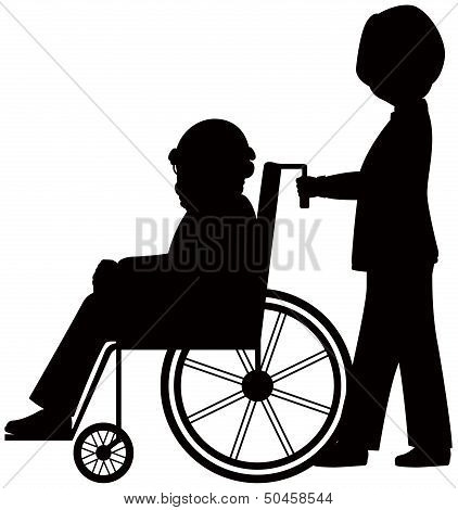 Nurse With Patient In Wheelchair