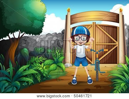 Illustration of a happy boy standing beside his bike inside the gated yard
