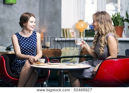 Womans Make Dialogue And Snile Over Joke