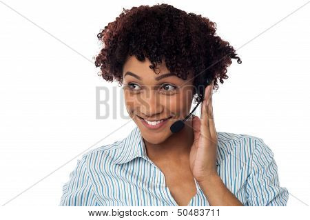 Casual Shot Of A Call Centre Executive Looking Away
