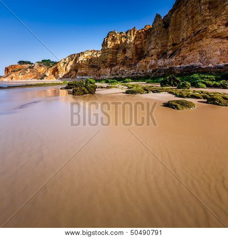 Rocks And Cliffs Of Porto De Mos Beach In The Morning, Lagos, Algarve, Portugal