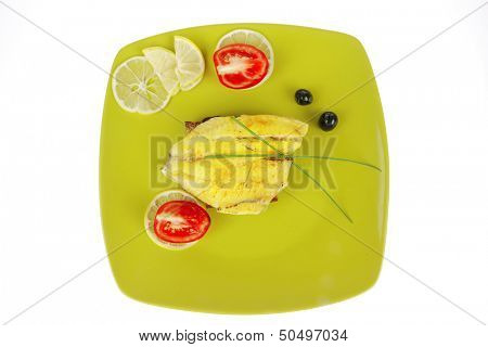 savory plate: roast golden seafish fillet with vegetables and citrus