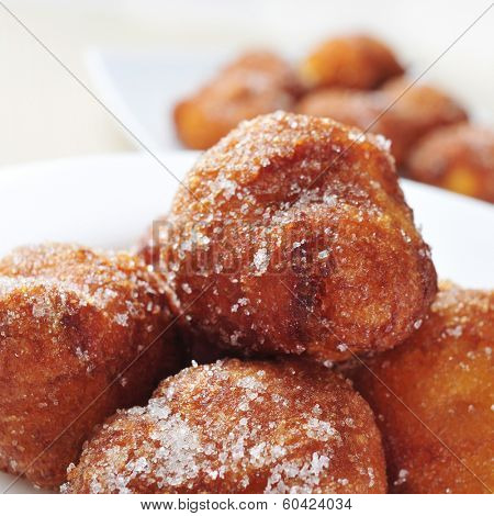 a pile of bunyols de Quaresma, typical pastries of Catalonia, Spain, eaten in Lent