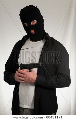Man Holding a Pistol Gun