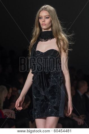 NEW YORK-FEB 8: A model walks the runway at the Jill Stuart fashion show during Mercedes-Benz Fashion Week Fall 2014 at Lincoln Center on February 8, 2014 in New York City.