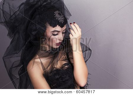 beautiful glamour model with black veil