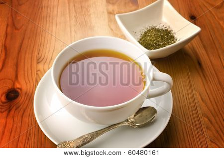 Cup of tea on wooden background
