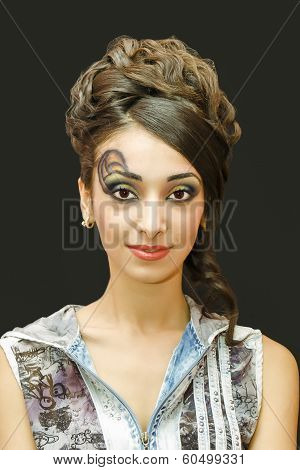 beautiful young girl with a make up .