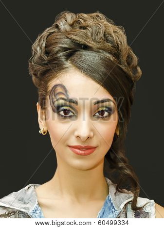 beautiful young girl with a make up .