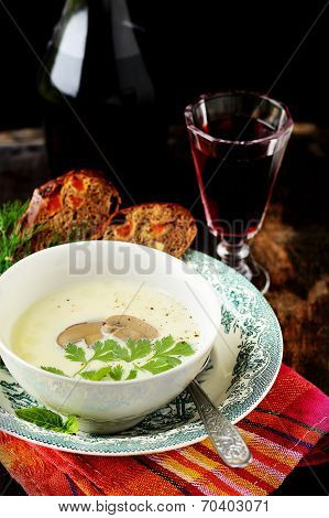 Potato cream soup with champignons