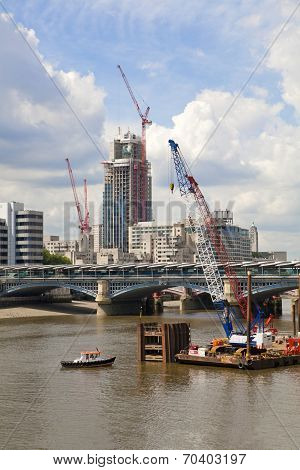 LONDON, UK - JUNE 30, 2014: New building site with cranes in Bank of England aria